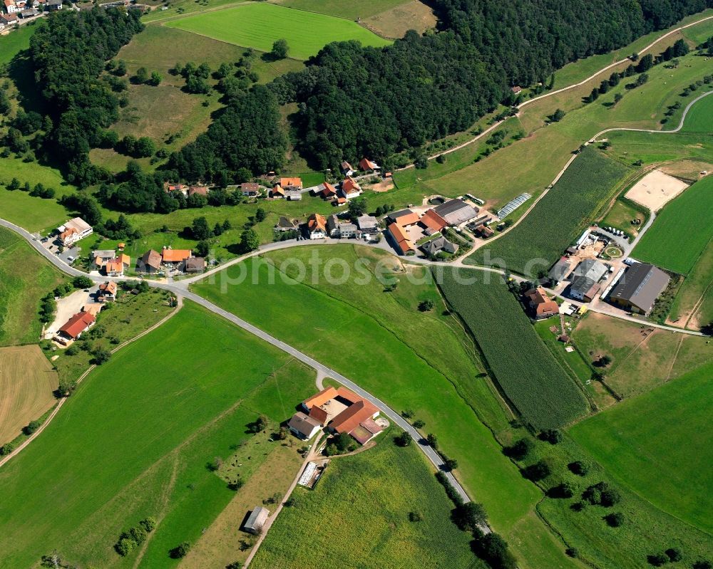 Aerial image Ober-Ostern - Village - view on the edge of forested areas in Ober-Ostern in the state Hesse, Germany