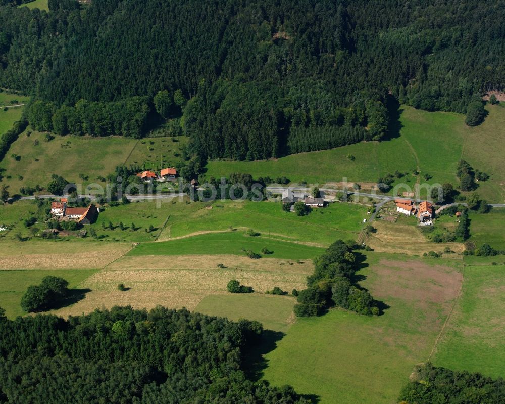 Ober-Sensbach from the bird's eye view: Village - view on the edge of forested areas in Ober-Sensbach in the state Hesse, Germany