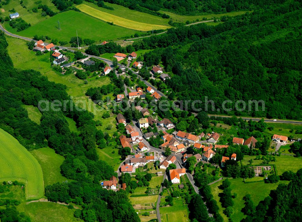 Rathskirchen from the bird's eye view: Village - view on the edge of forested areas in Rathskirchen in the state Rhineland-Palatinate, Germany