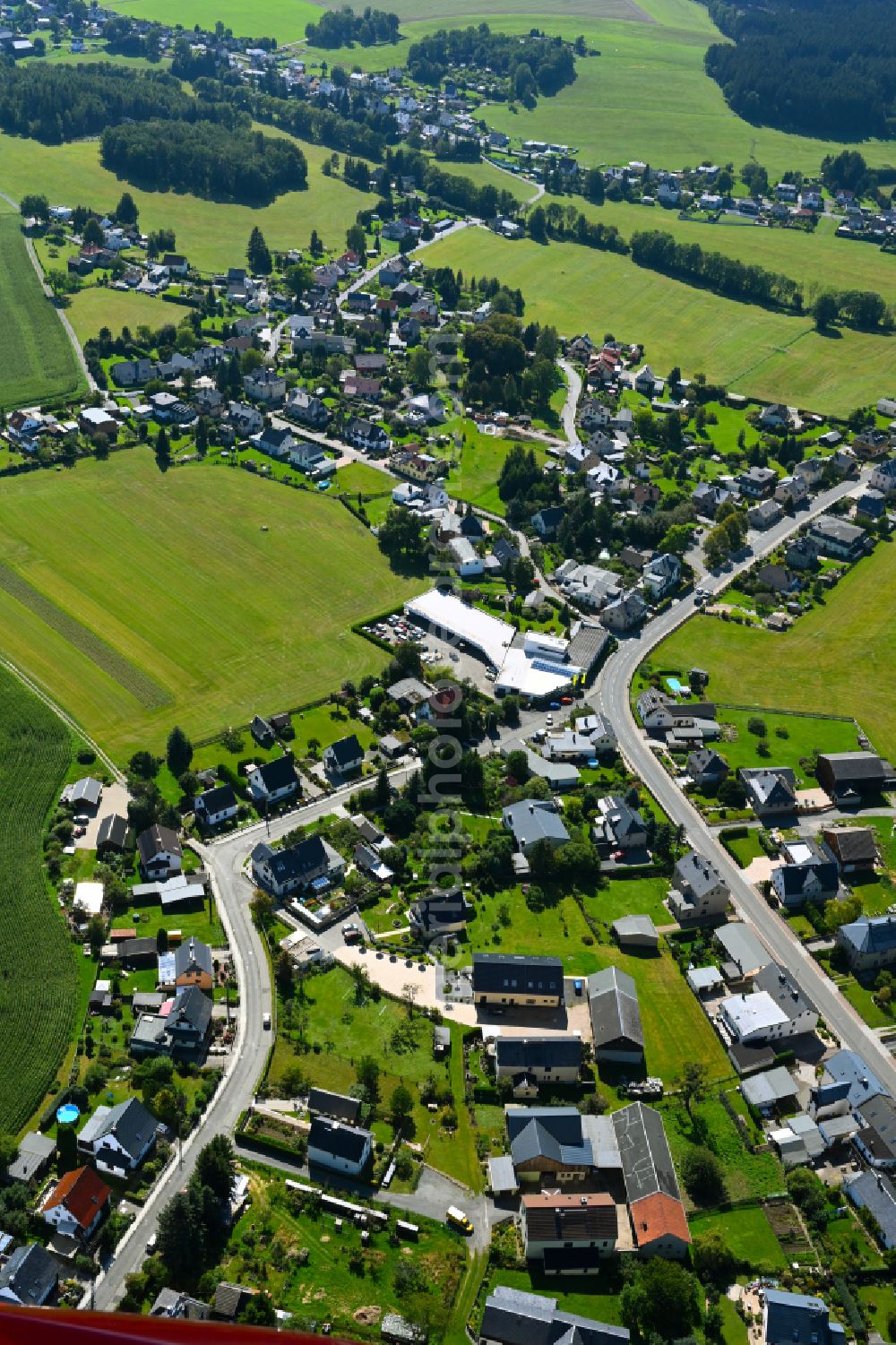 Aerial image Rebesgrün - Village - view on the edge of forested areas in Rebesgrün in the state Saxony, Germany