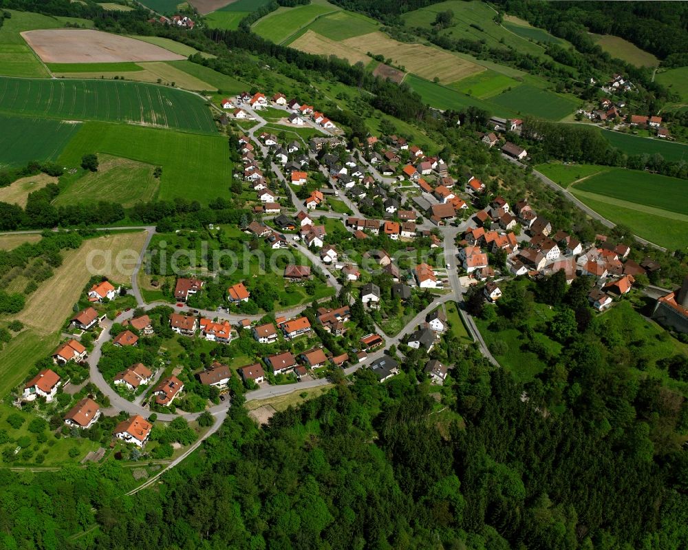 Reichenberg from the bird's eye view: Village - view on the edge of forested areas in Reichenberg in the state Baden-Wuerttemberg, Germany