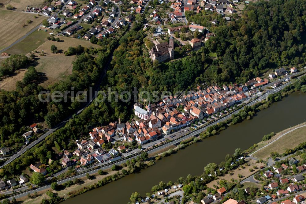 Rothenfels from the bird's eye view: Village - view on the edge of forested areas in Rothenfels in the state Bavaria, Germany