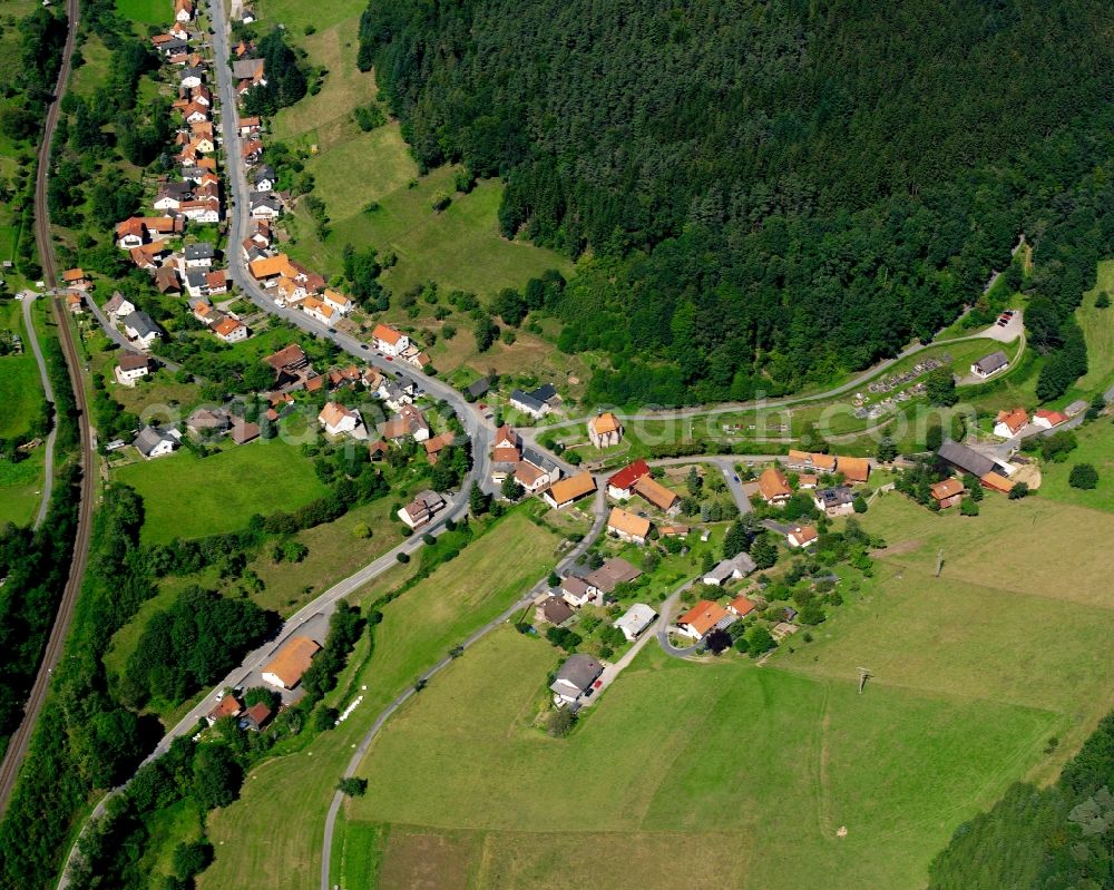 Schöllenbach from the bird's eye view: Village - view on the edge of forested areas in Schöllenbach in the state Hesse, Germany