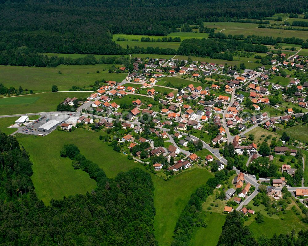 Schömberg from the bird's eye view: Village - view on the edge of forested areas in Schömberg in the state Baden-Wuerttemberg, Germany