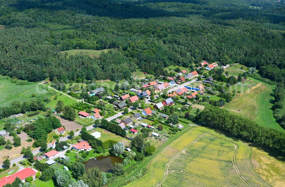 Schwiggerow from above - Village - view on the edge of forested areas in Schwiggerow in the state Mecklenburg - Western Pomerania, Germany