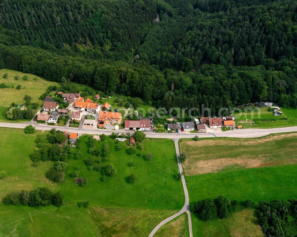 Stollenhof from the bird's eye view: Village - view on the edge of forested areas in Stollenhof in the state Baden-Wuerttemberg, Germany