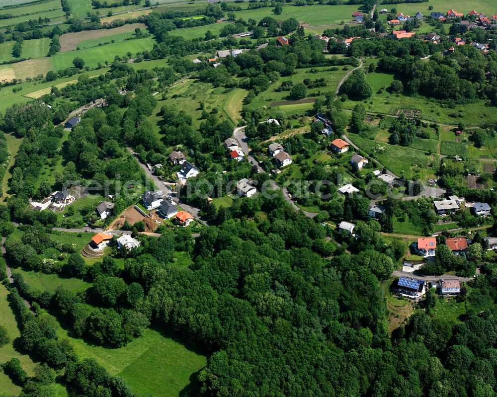 Ulrichstein from above - Village - view on the edge of forested areas in Ulrichstein in the state Hesse, Germany