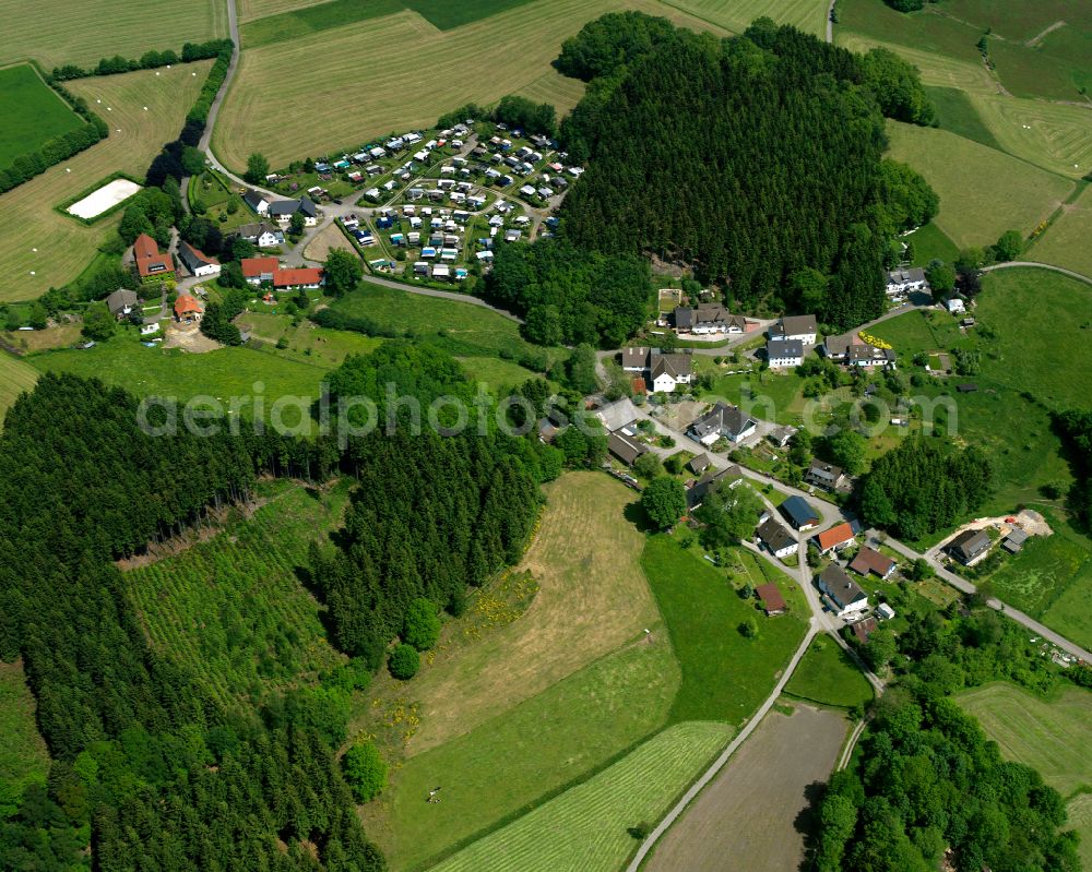 Valbert from the bird's eye view: Village - view on the edge of forested areas in Valbert in the state North Rhine-Westphalia, Germany