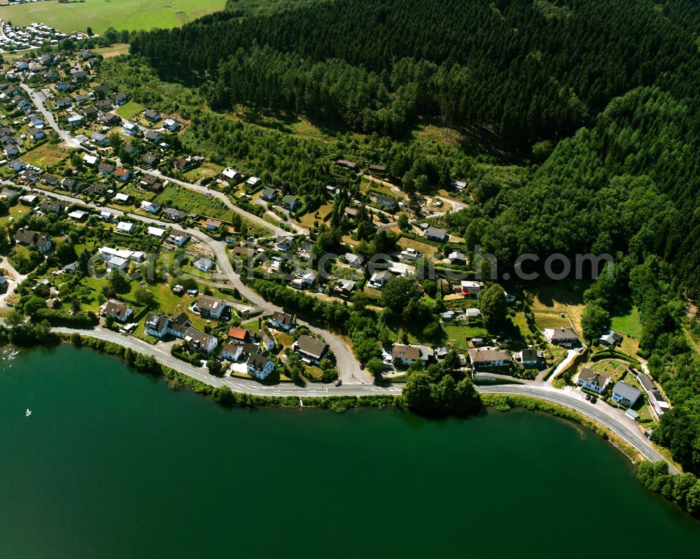 Valbert from the bird's eye view: Village - view on the edge of forested areas in Valbert in the state North Rhine-Westphalia, Germany