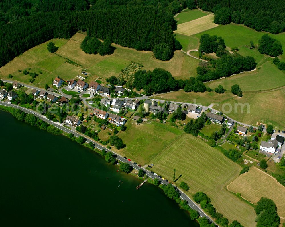 Valbert from the bird's eye view: Village - view on the edge of forested areas in Valbert in the state North Rhine-Westphalia, Germany