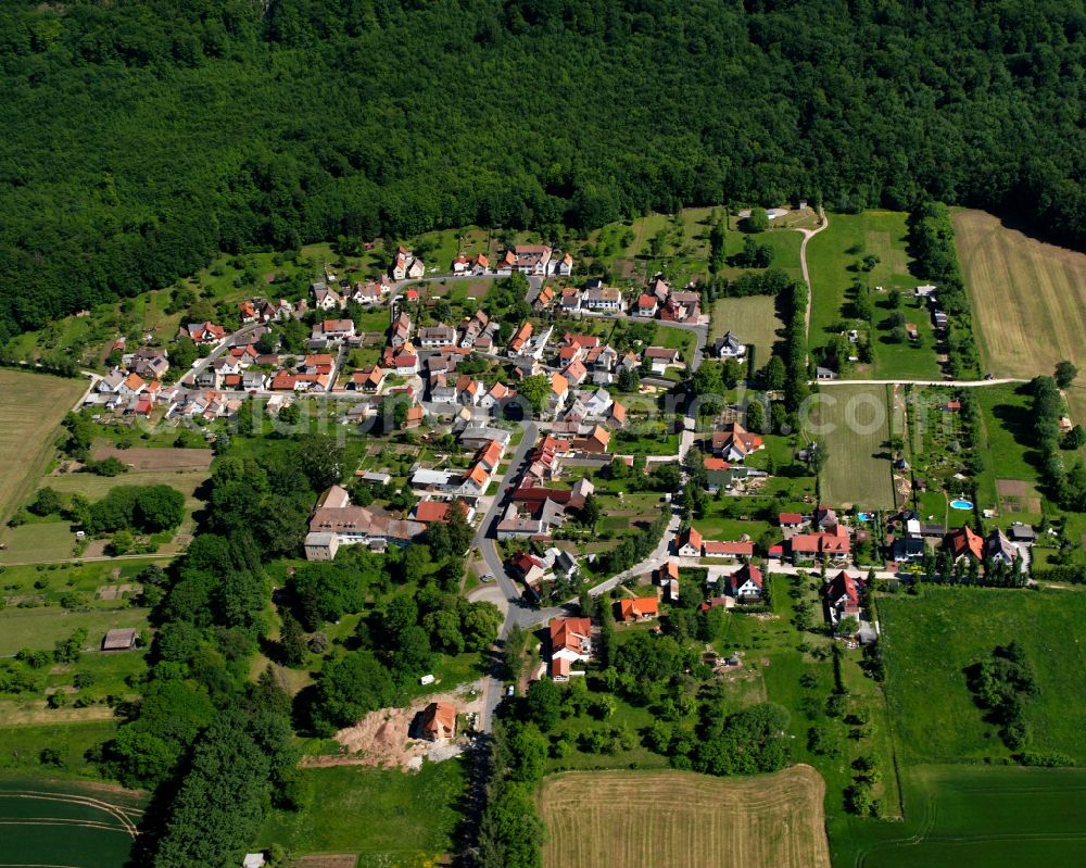 Vollenborn from the bird's eye view: Village - view on the edge of forested areas in Vollenborn in the state Thuringia, Germany