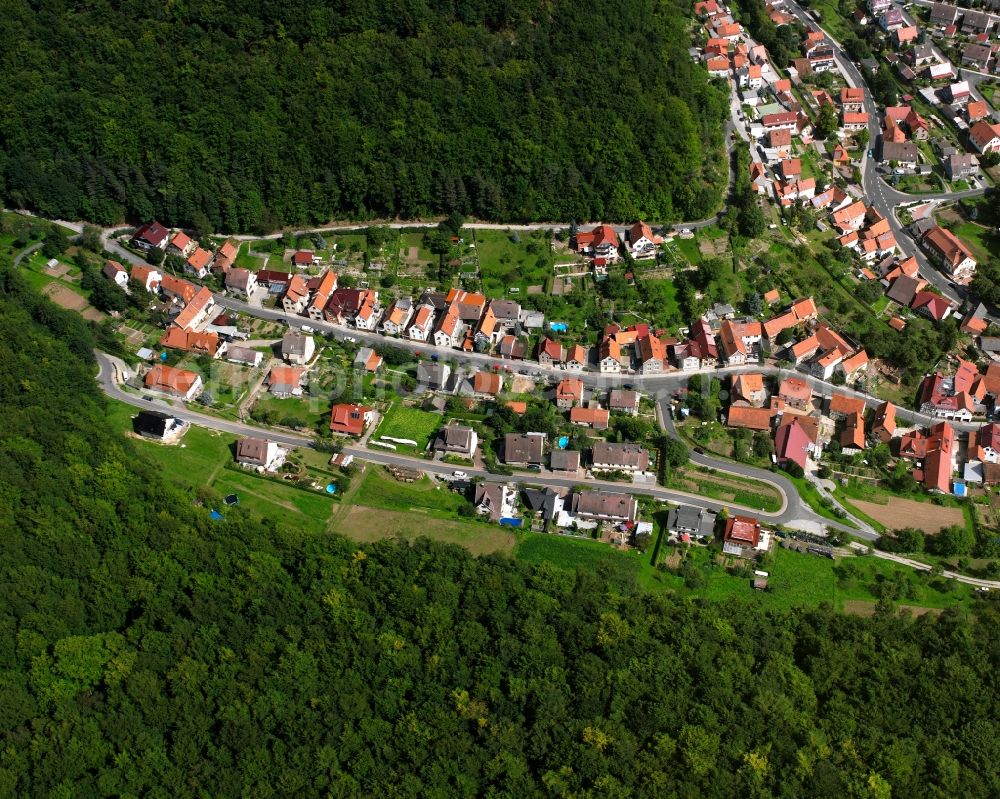 Wendehausen from the bird's eye view: Village - view on the edge of forested areas in Wendehausen in the state Thuringia, Germany