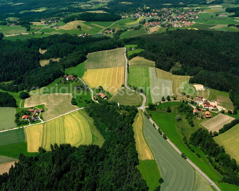 Willersberg from the bird's eye view: Village - view on the edge of forested areas in Willersberg in the state Bavaria, Germany