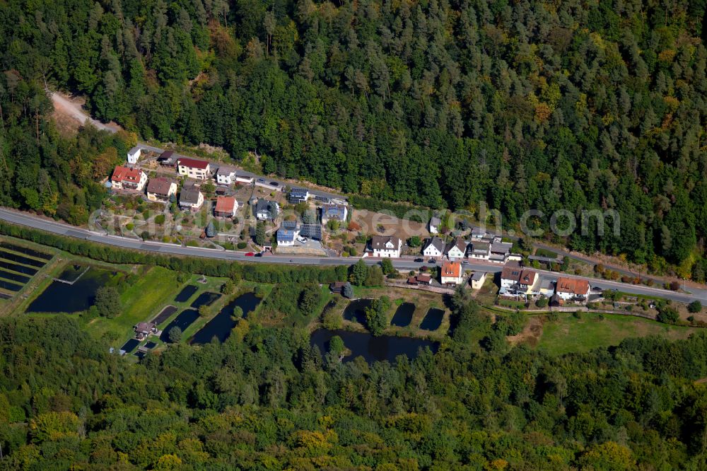 Aerial image Windheim - Village - view on the edge of forested areas in Windheim in the state Bavaria, Germany