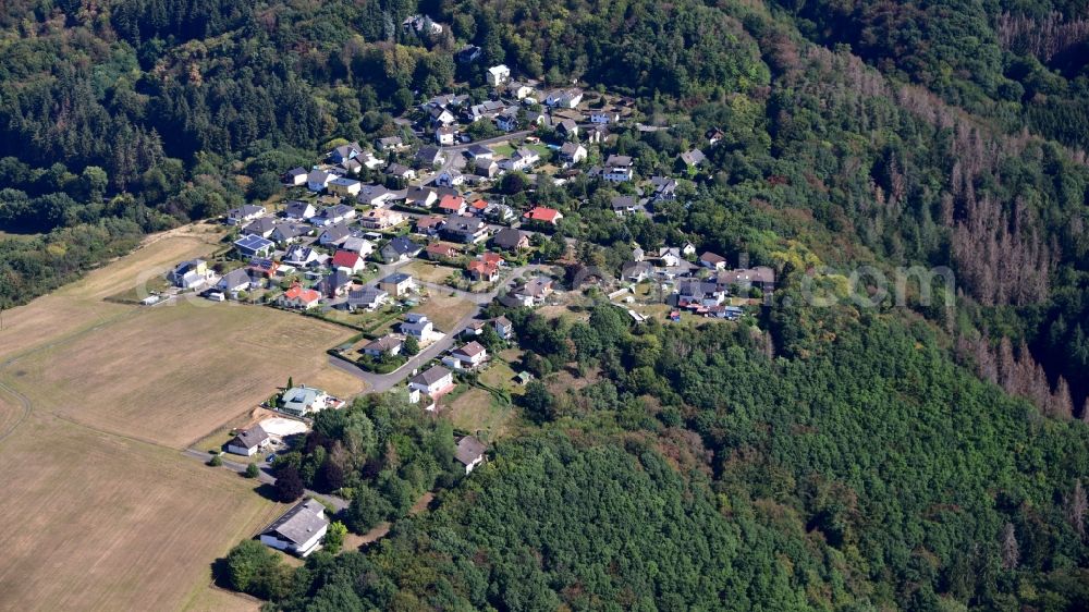 Wolfenacker from the bird's eye view: Village - view on the edge of forested areas in Wolfenacker in the state Rhineland-Palatinate, Germany