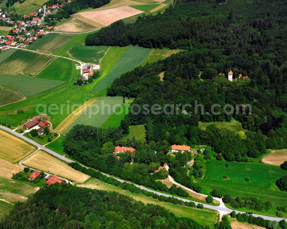 Wolfsdrüssel from the bird's eye view: Village - view on the edge of forested areas in Wolfsdrüssel in the state Bavaria, Germany