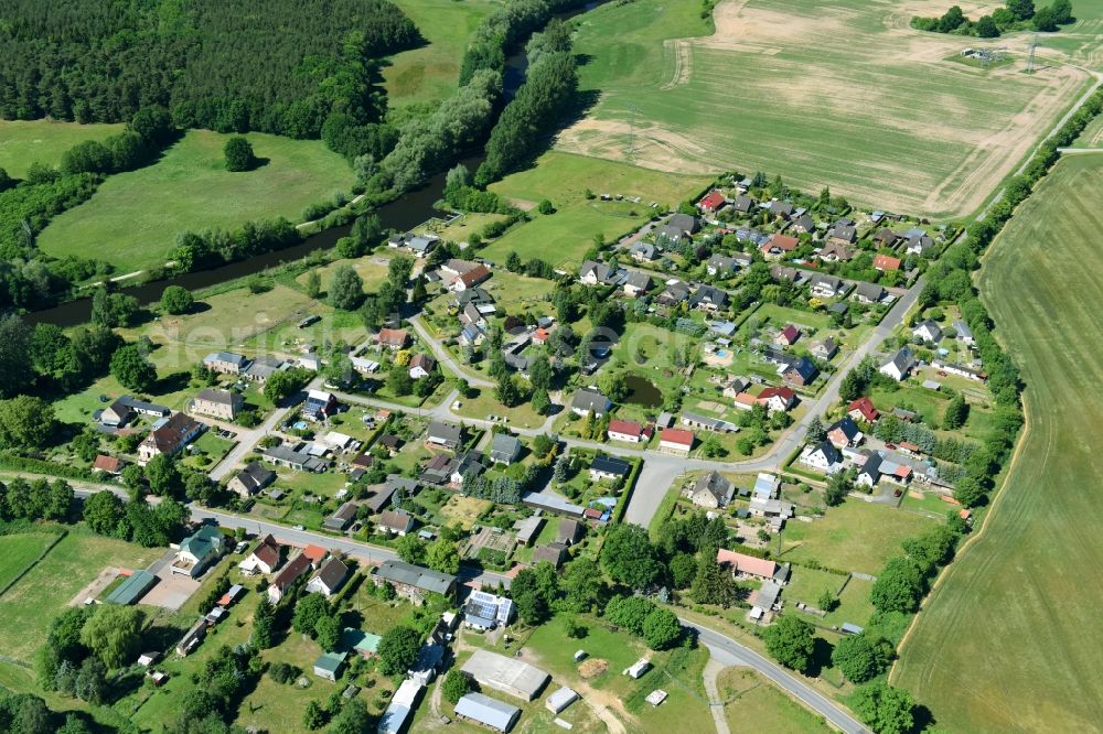 Neuburg from the bird's eye view: Village on the river bank areas of Elde in Neuburg in the state Mecklenburg - Western Pomerania, Germany