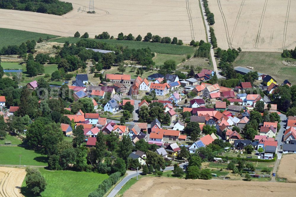 Aerial photograph Hammerstedt - Agricultural land and field boundaries border the settlement area of a??a??the village Hammerstedt in the state Thuringia, Germany