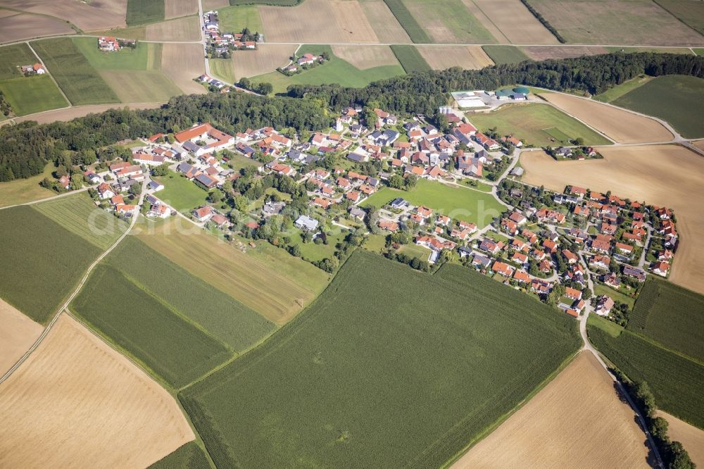 Berghofen from above - Agricultural land, fields and forest surround the settlement area of a??a??the village in Berghofen in the state Bavaria, Germany