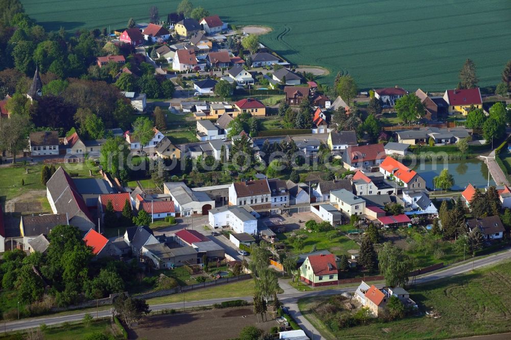 Poley from the bird's eye view: Agricultural land and field borders surround the settlement area of the village in Poley in the state Saxony-Anhalt, Germany