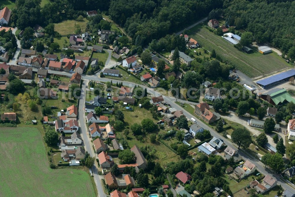 Sallgast from above - View of the village of Sallgast in the state of Brandenburg. View of residential houses and small farms along the edge of the village