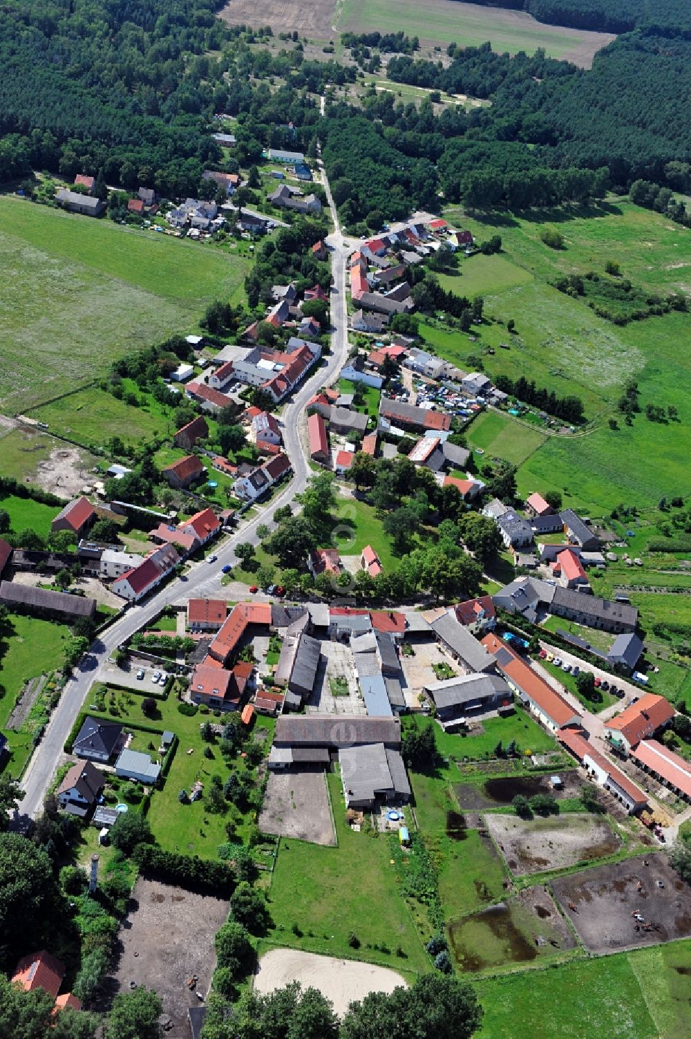 Aerial image Saalow - View of the Dorfaue in Saalow in Brandenburg. On the Dorfaue, which has the shape of a Rundling there is a Schubertsche barn windmil. Also, in Saalow there is the house of the parents of the sculptor Gottfried Schadow