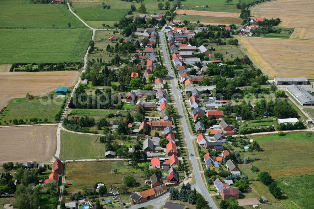 Barenthin from the bird's eye view: Agricultural land and field borders surround the settlement area of the village in Barenthin in the state Brandenburg, Germany