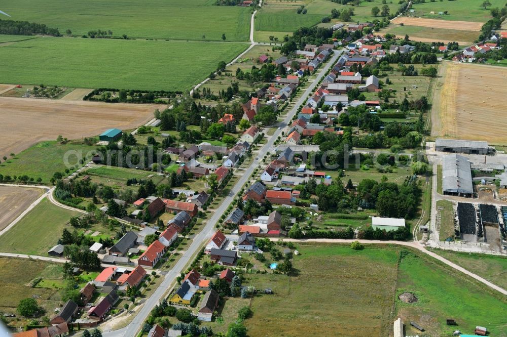 Barenthin from the bird's eye view: Agricultural land and field borders surround the settlement area of the village in Barenthin in the state Brandenburg, Germany