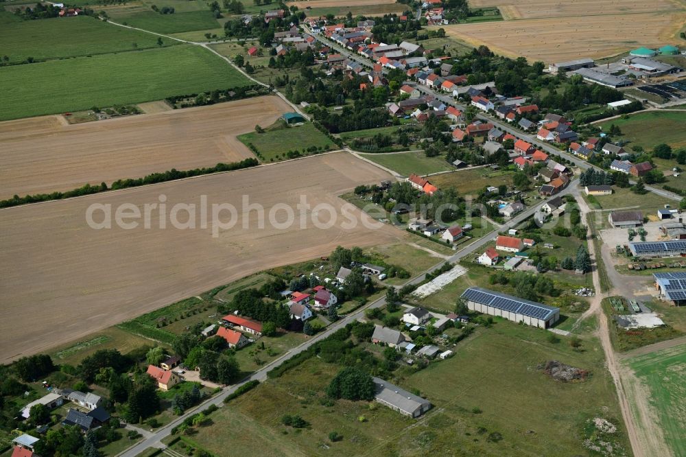 Barenthin from the bird's eye view: Agricultural land and field borders surround the settlement area of the village in Barenthin in the state Brandenburg, Germany