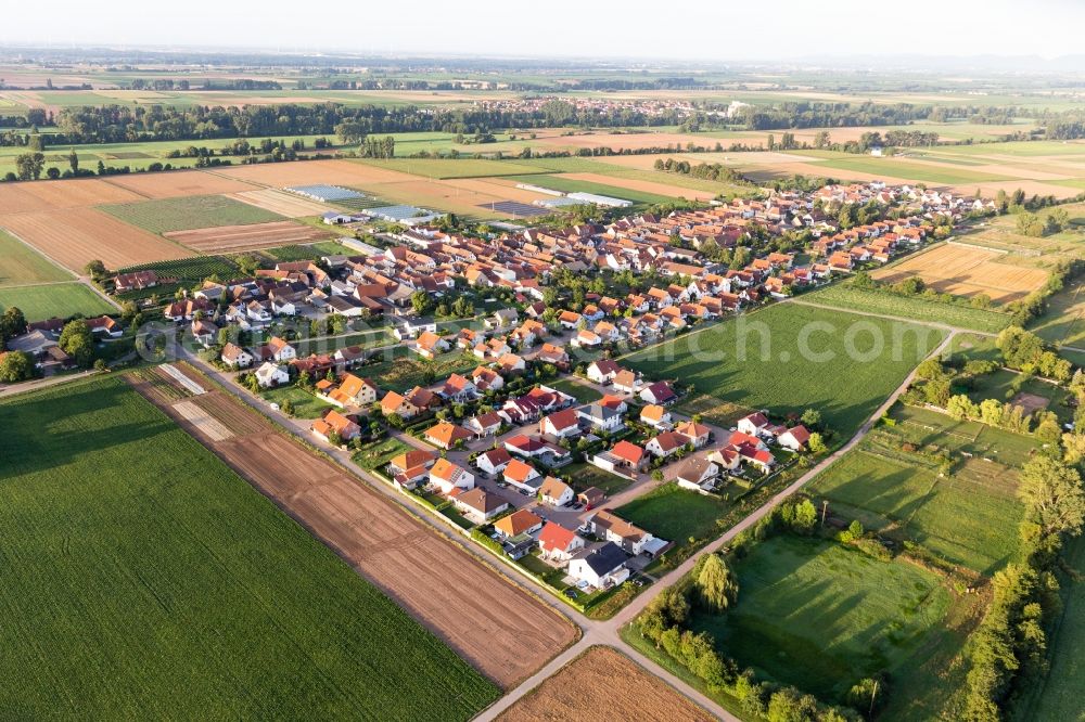 Aerial photograph Böbingen - Agricultural land and field borders surround the settlement area of the village in Boebingen in the state Rhineland-Palatinate, Germany