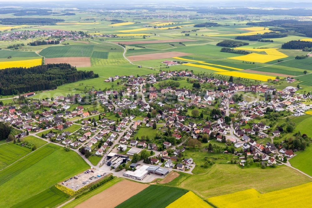 Aerial image Dornhan - Agricultural land and field borders surround the settlement area of the village in Dornhan in the state Baden-Wurttemberg, Germany