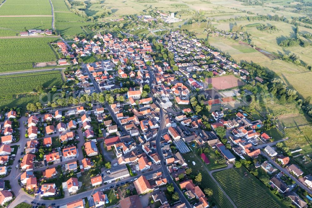 Erpolzheim from above - Agricultural land and field borders surround the settlement area of the village in Erpolzheim in the state Rhineland-Palatinate, Germany