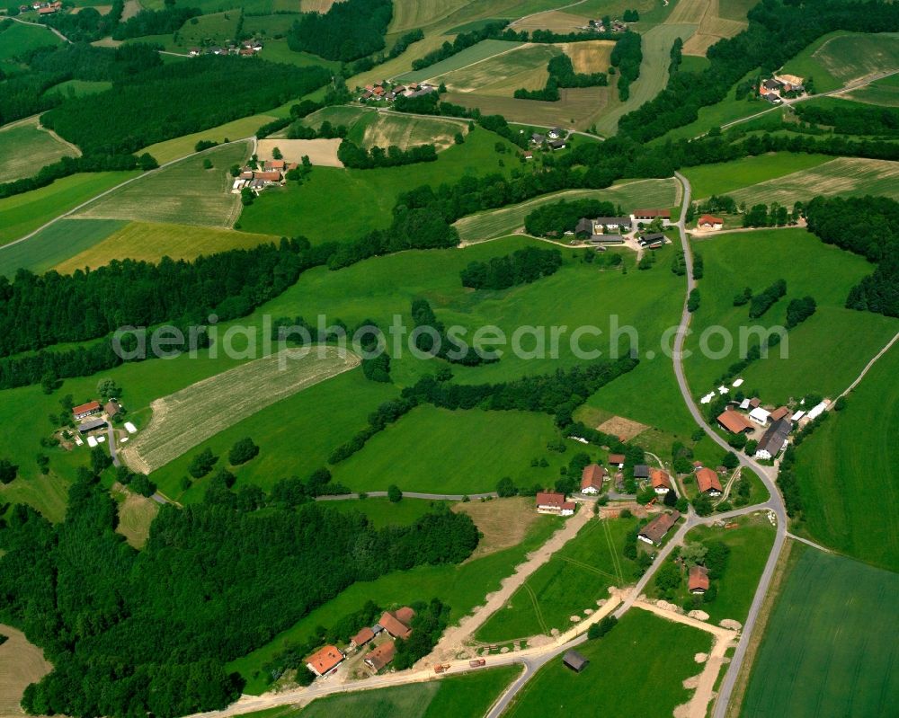 Aerial image Absetz - Agricultural land and field boundaries surround the settlement area of the village in Absetz in the state Bavaria, Germany