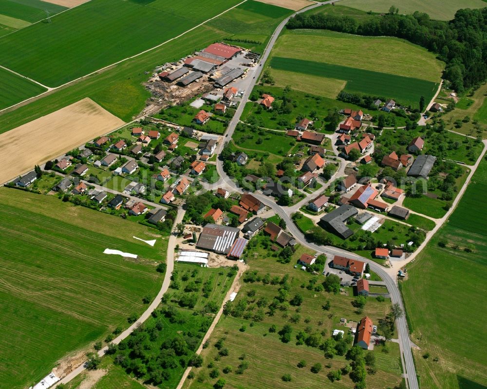 Adelstetten from the bird's eye view: Agricultural land and field boundaries surround the settlement area of the village in Adelstetten in the state Baden-Wuerttemberg, Germany