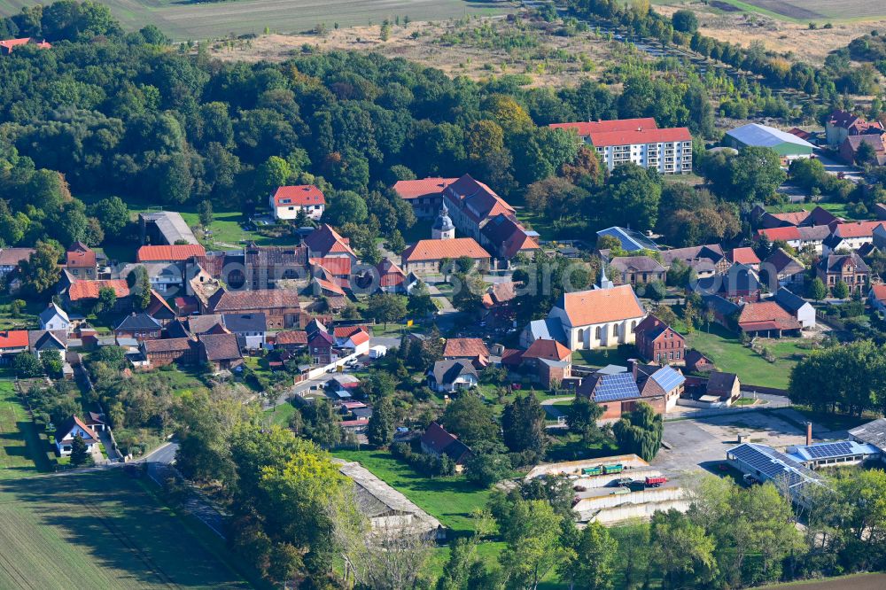 Aerial photograph Aderstedt - Agricultural land and field boundaries surround the settlement area of the village in Aderstedt in the state Saxony-Anhalt, Germany