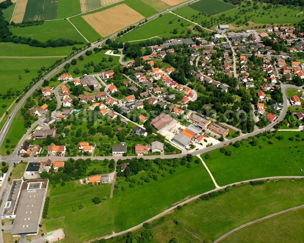 Aichelberg from above - Agricultural land and field boundaries surround the settlement area of the village in Aichelberg in the state Baden-Wuerttemberg, Germany