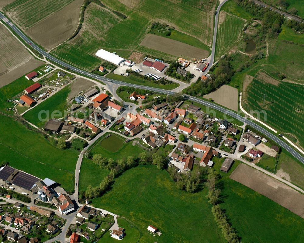 Alberndorf from the bird's eye view: Agricultural land and field boundaries surround the settlement area of the village in Alberndorf in the state Bavaria, Germany