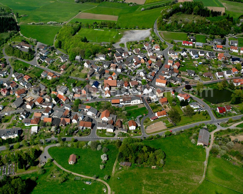 Aerial image Allertshausen - Agricultural land and field boundaries surround the settlement area of the village in Allertshausen in the state Hesse, Germany