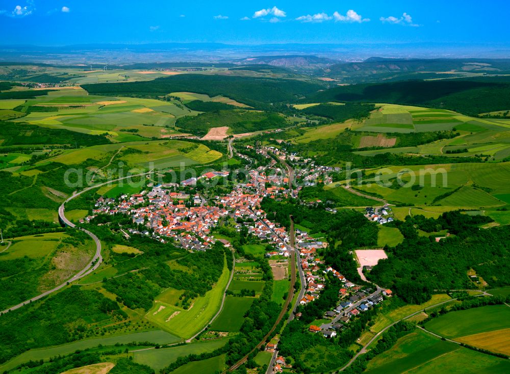 Aerial image Alsenz - Agricultural land and field boundaries surround the settlement area of the village in Alsenz in the state Rhineland-Palatinate, Germany