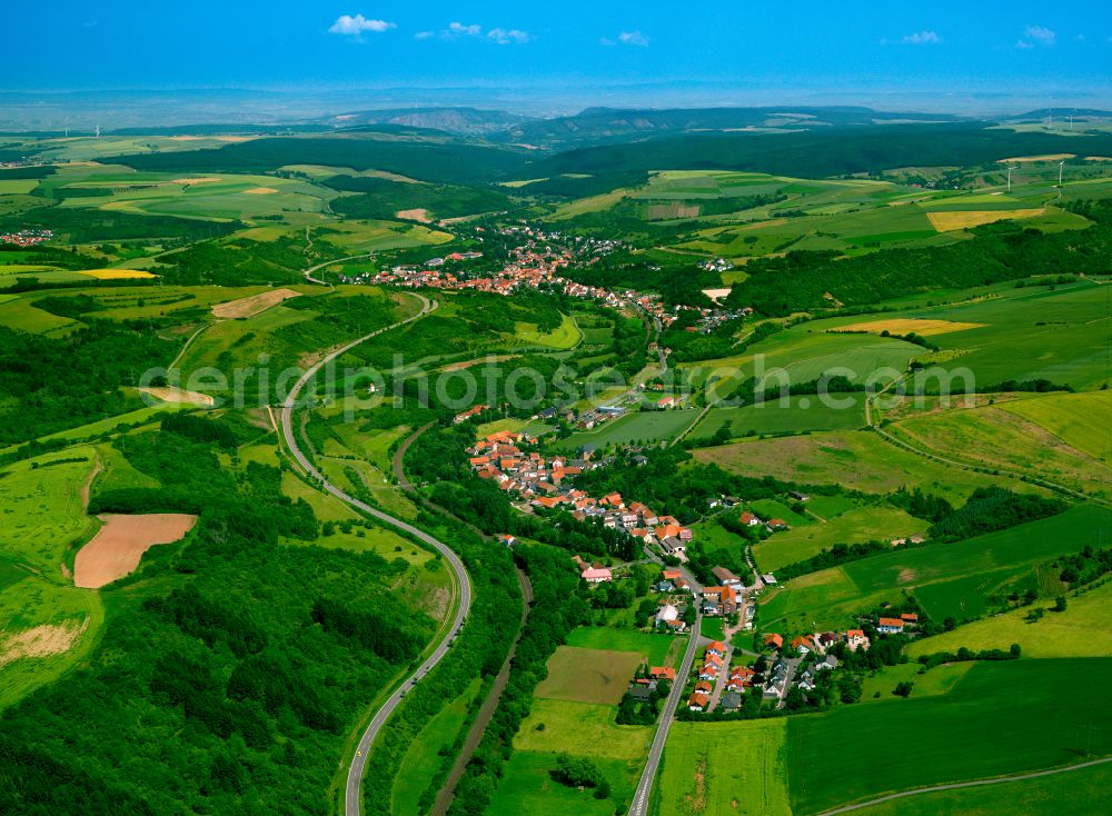 Aerial photograph Alsenz - Agricultural land and field boundaries surround the settlement area of the village in Alsenz in the state Rhineland-Palatinate, Germany