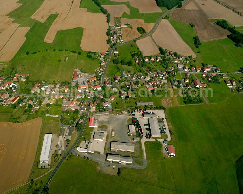 Am alten Mahl from above - Agricultural land and field boundaries surround the settlement area of the village in Am alten Mahl in the state Saxony, Germany