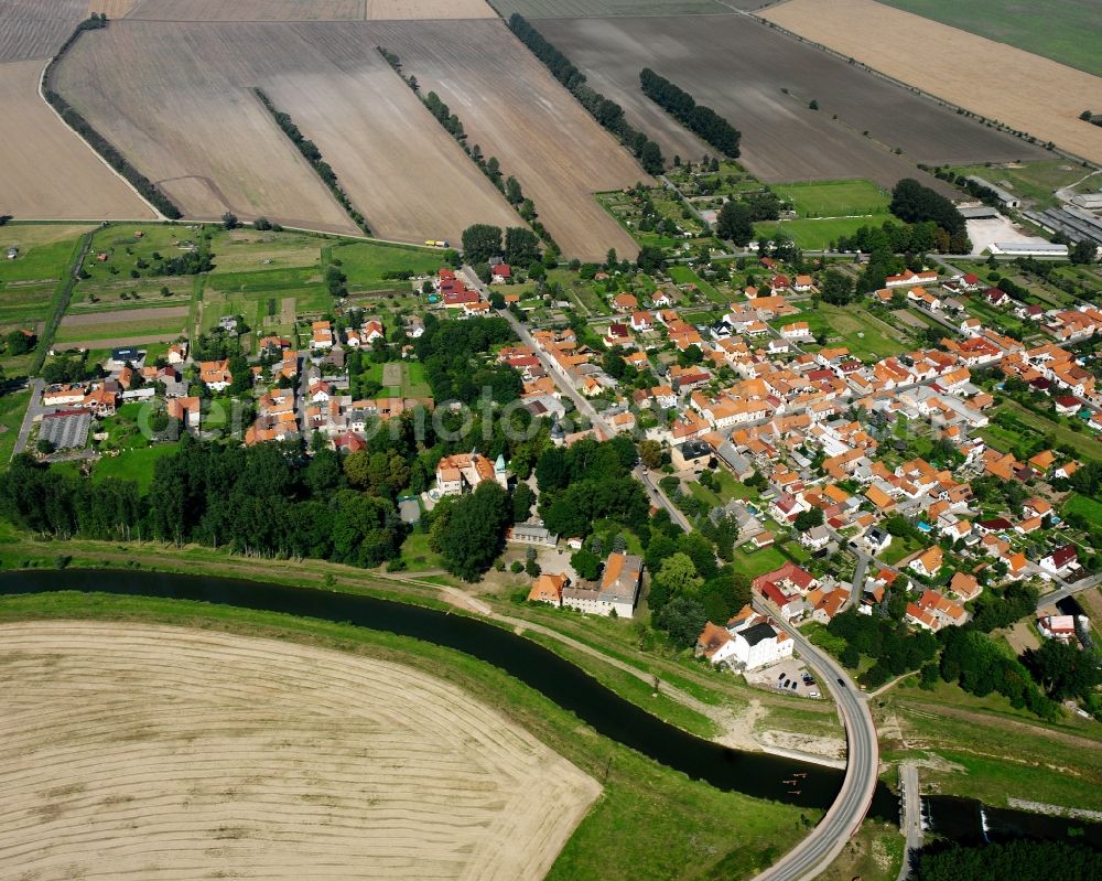 Aerial image Altengottern - Agricultural land and field boundaries surround the settlement area of the village in Altengottern in the state Thuringia, Germany