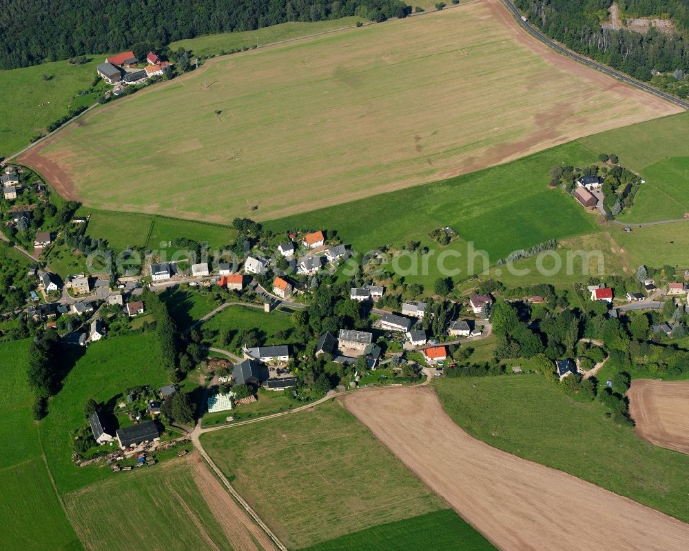 Aerial image Altenhain - Agricultural land and field boundaries surround the settlement area of the village in Altenhain in the state Saxony, Germany