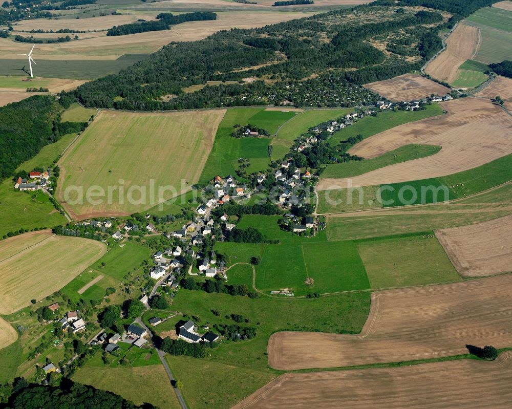 Altenhain from above - Agricultural land and field boundaries surround the settlement area of the village in Altenhain in the state Saxony, Germany