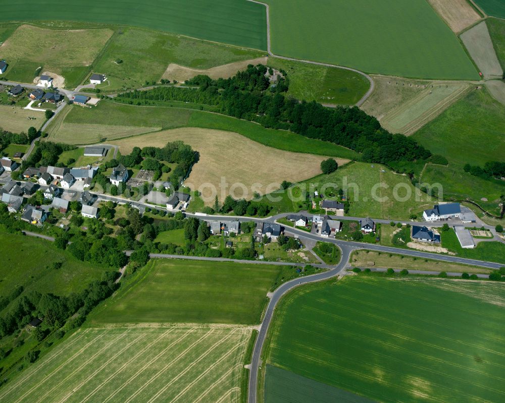 Aerial image Alterkülz - Agricultural land and field boundaries surround the settlement area of the village in Alterkülz in the state Rhineland-Palatinate, Germany