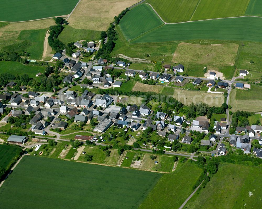 Aerial photograph Alterkülz - Agricultural land and field boundaries surround the settlement area of the village in Alterkülz in the state Rhineland-Palatinate, Germany