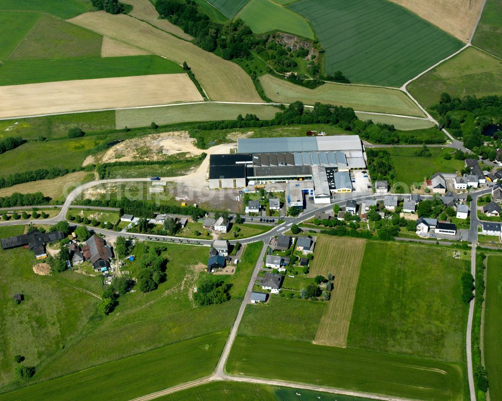 Aerial photograph Alterkülz - Agricultural land and field boundaries surround the settlement area of the village in Alterkülz in the state Rhineland-Palatinate, Germany