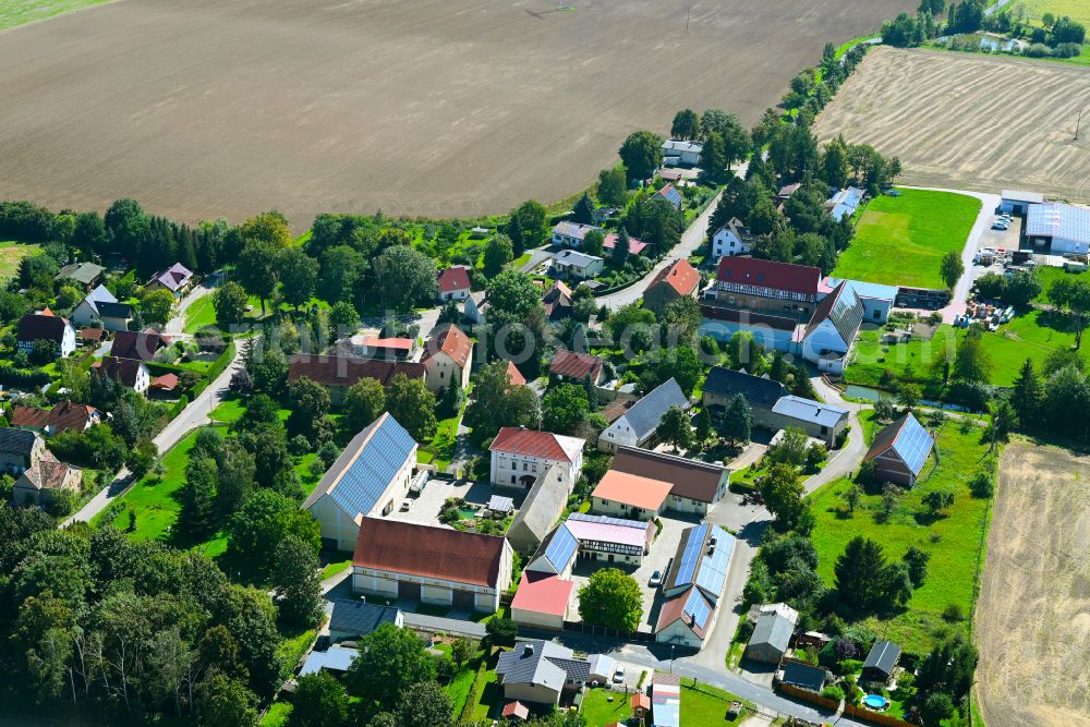 Aerial image Altkirchen - Agricultural land and field boundaries surround the settlement area of the village in Altkirchen in the state Thuringia, Germany