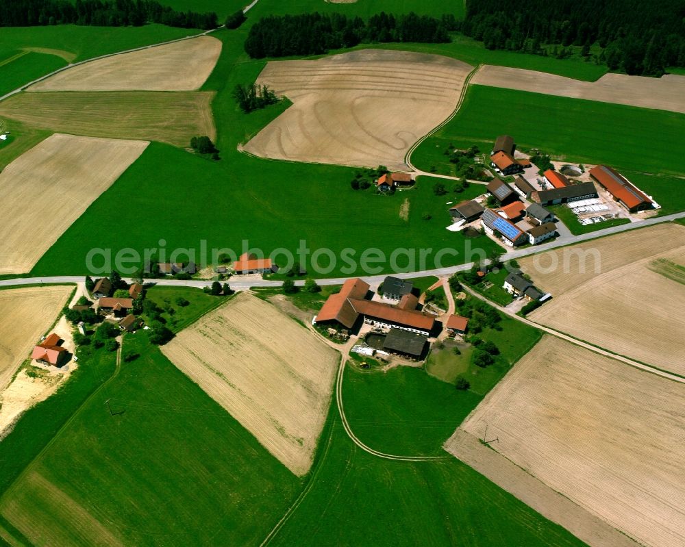 Ameringshub from above - Agricultural land and field boundaries surround the settlement area of the village in Ameringshub in the state Bavaria, Germany