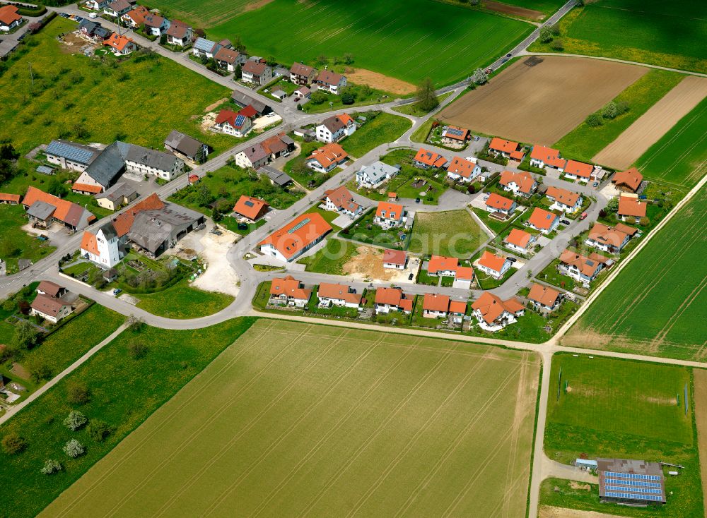 Aerial image Amstetten - Agricultural land and field boundaries surround the settlement area of the village in Amstetten in the state Baden-Wuerttemberg, Germany